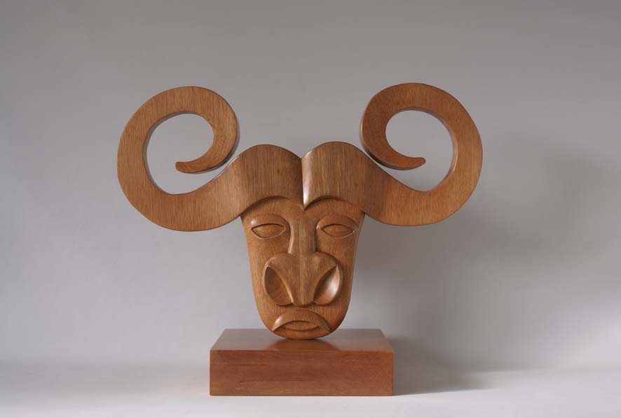 Búfalo, carved wood sculpture by Josefina Temín